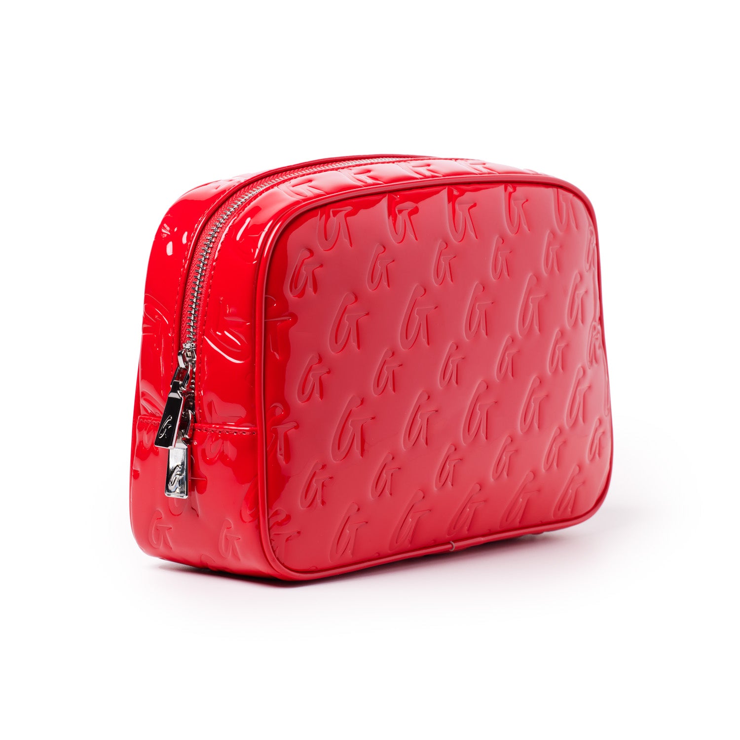 Red glossy toiletry bag with embossed monogram pattern, silver zipper, and compact rectangular shape.