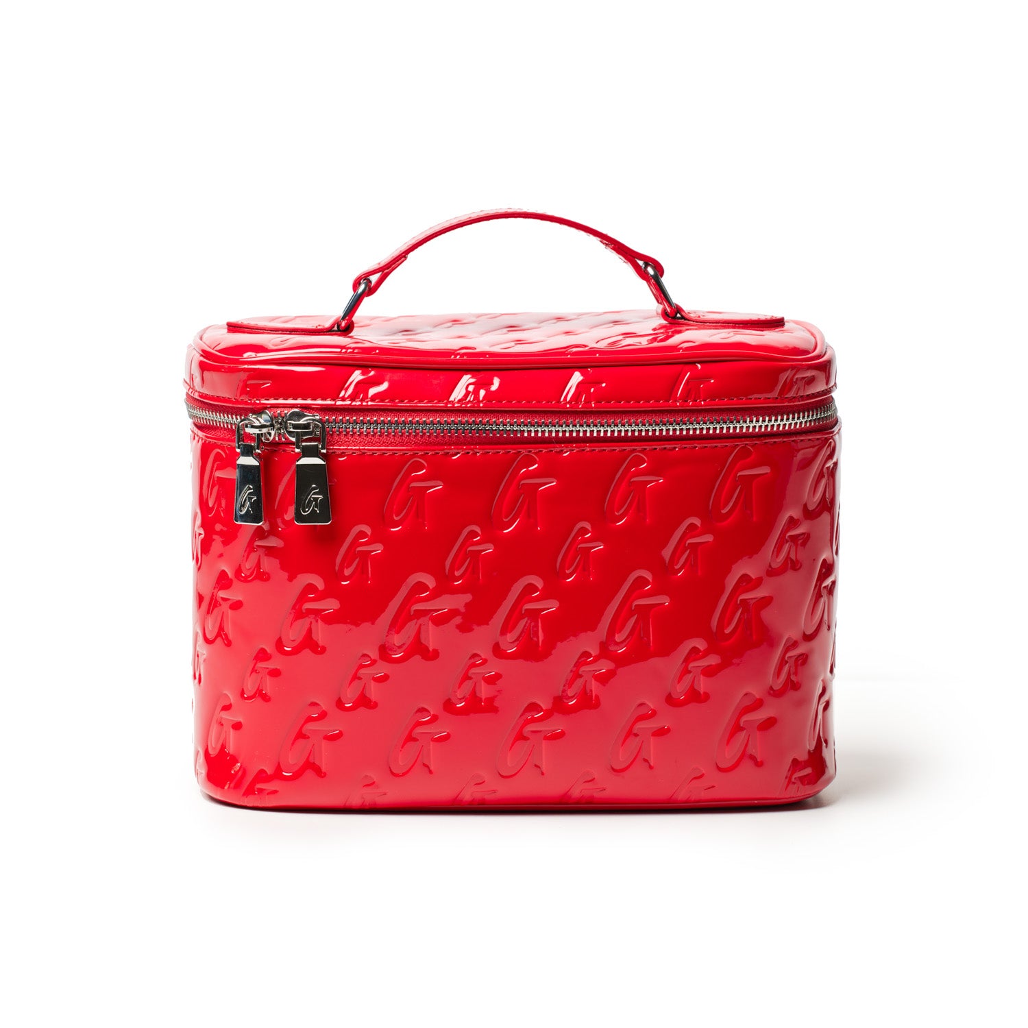 Red monogram toiletry bag with embossed G pattern, silver zipper, and top handle, featuring a mirror finish.