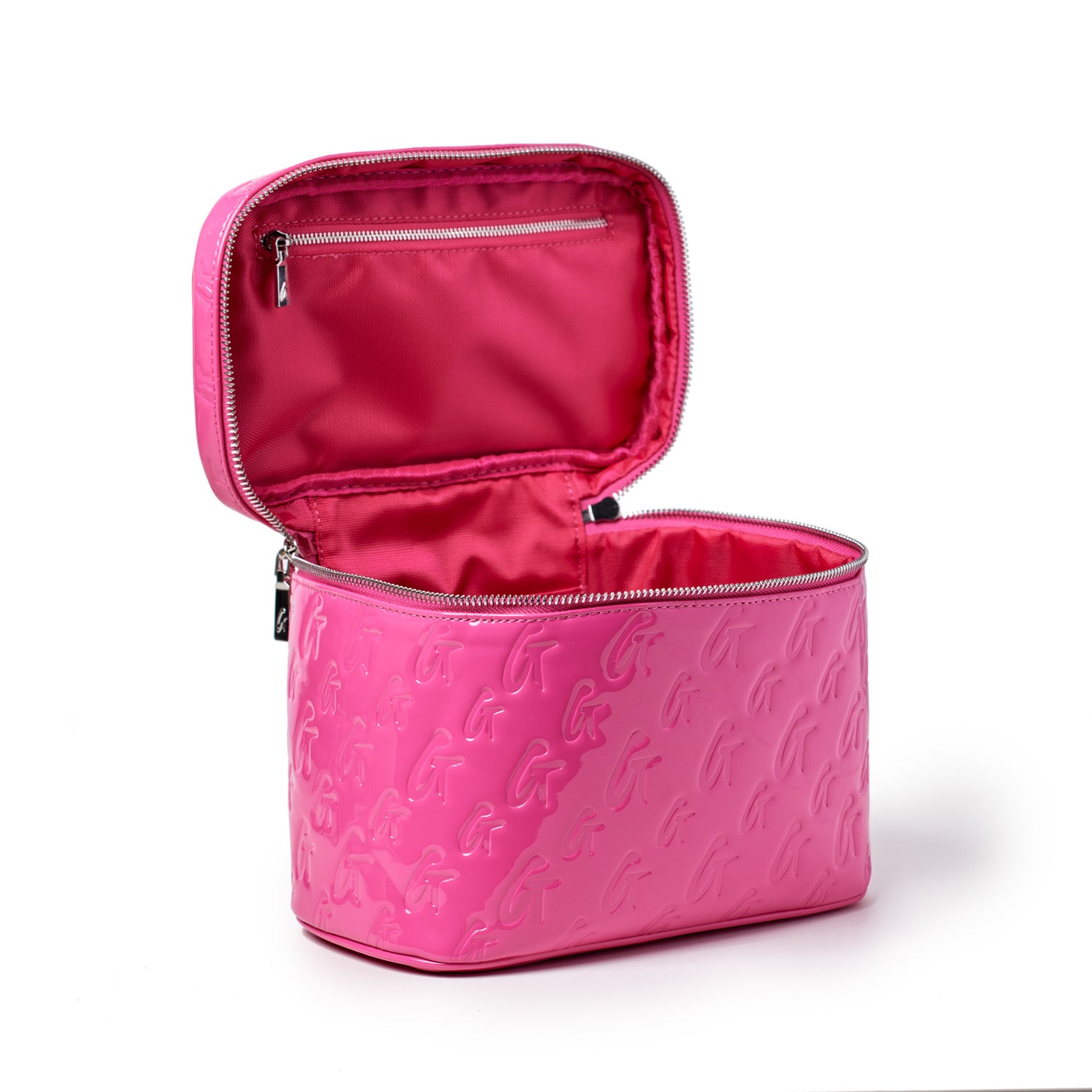 Large hot pink monogram toiletry bag with embossed G pattern, open to show pink interior and zippered compartments.