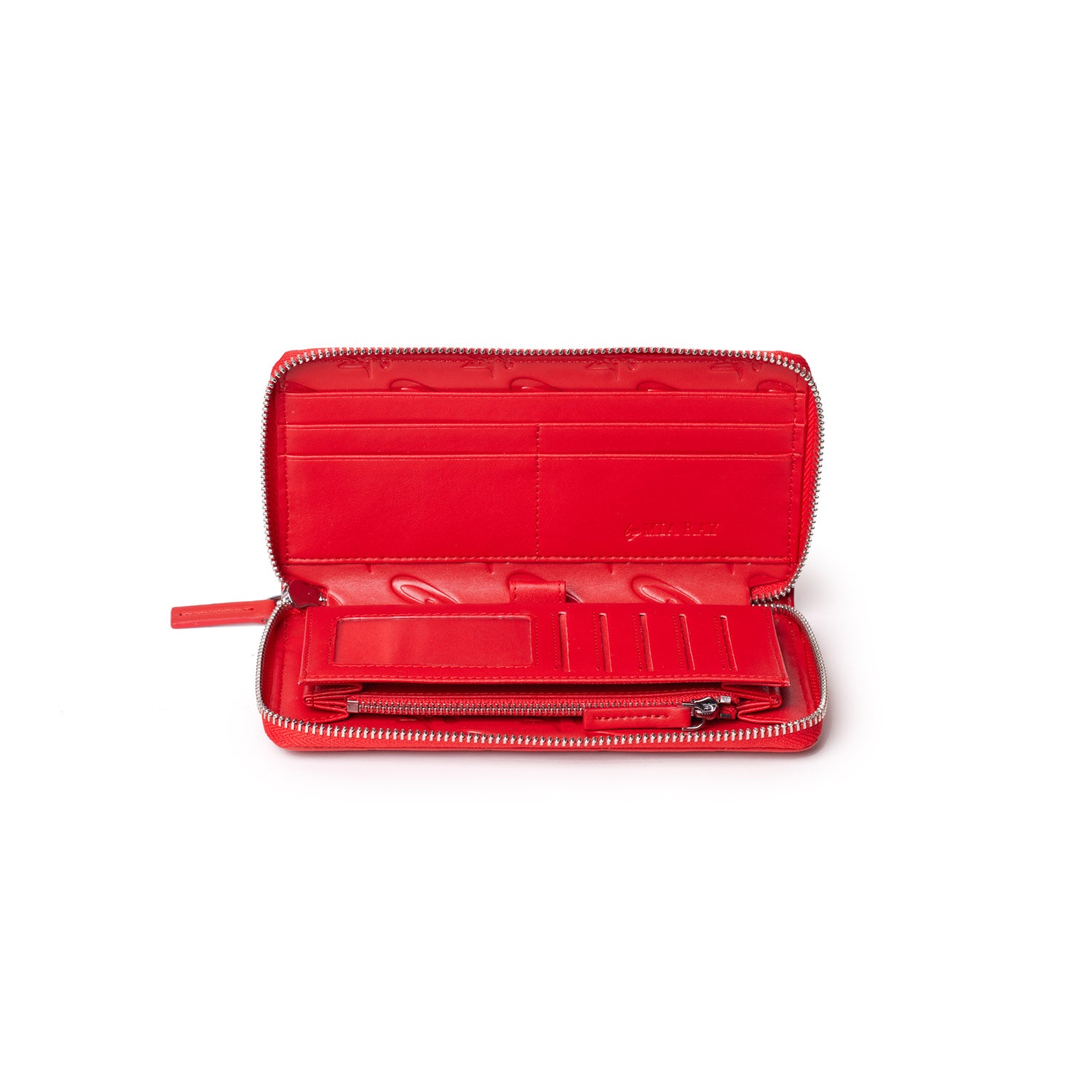 Red leather wallet with multiple card slots, a zippered coin pocket, and a signature logo interior, open to display organization.