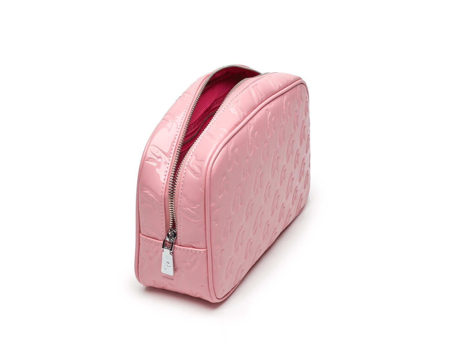 Small pink monogram toiletry bag with a reflective finish, embossed pattern, and a zipper closure.
