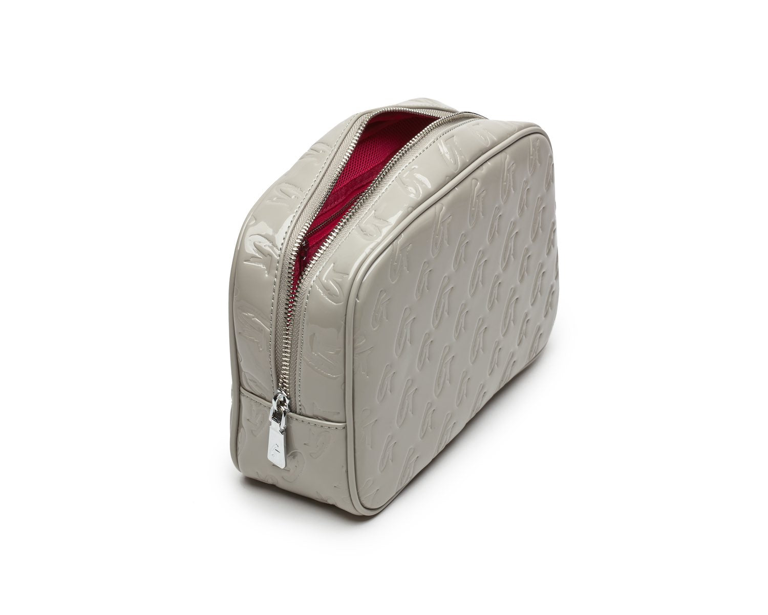 Small monogram toiletry bag in mirror gray with embossed pattern, zipper closure, and red interior lining.
