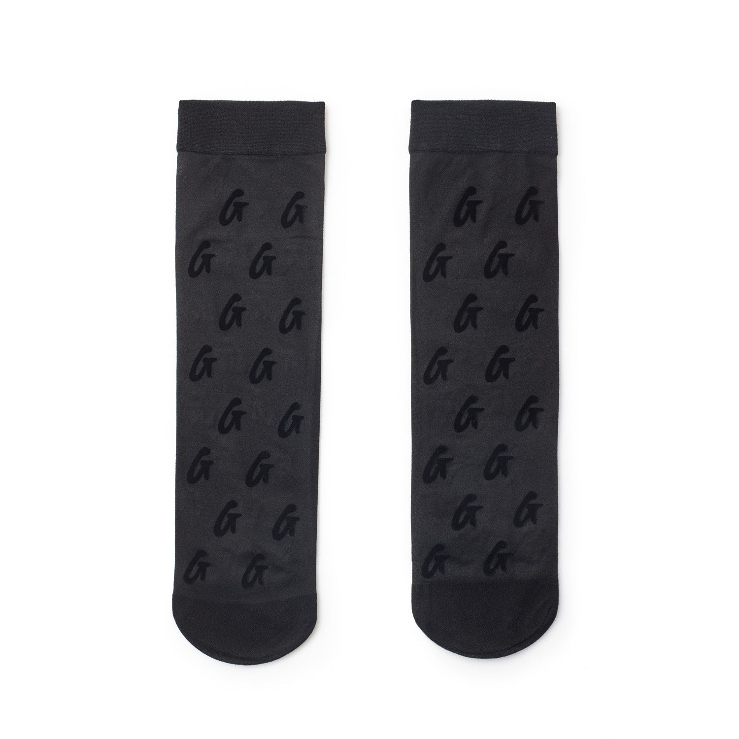 Black sheer logo socks with a repeating G logo pattern, featuring a sheer, semi-transparent design.