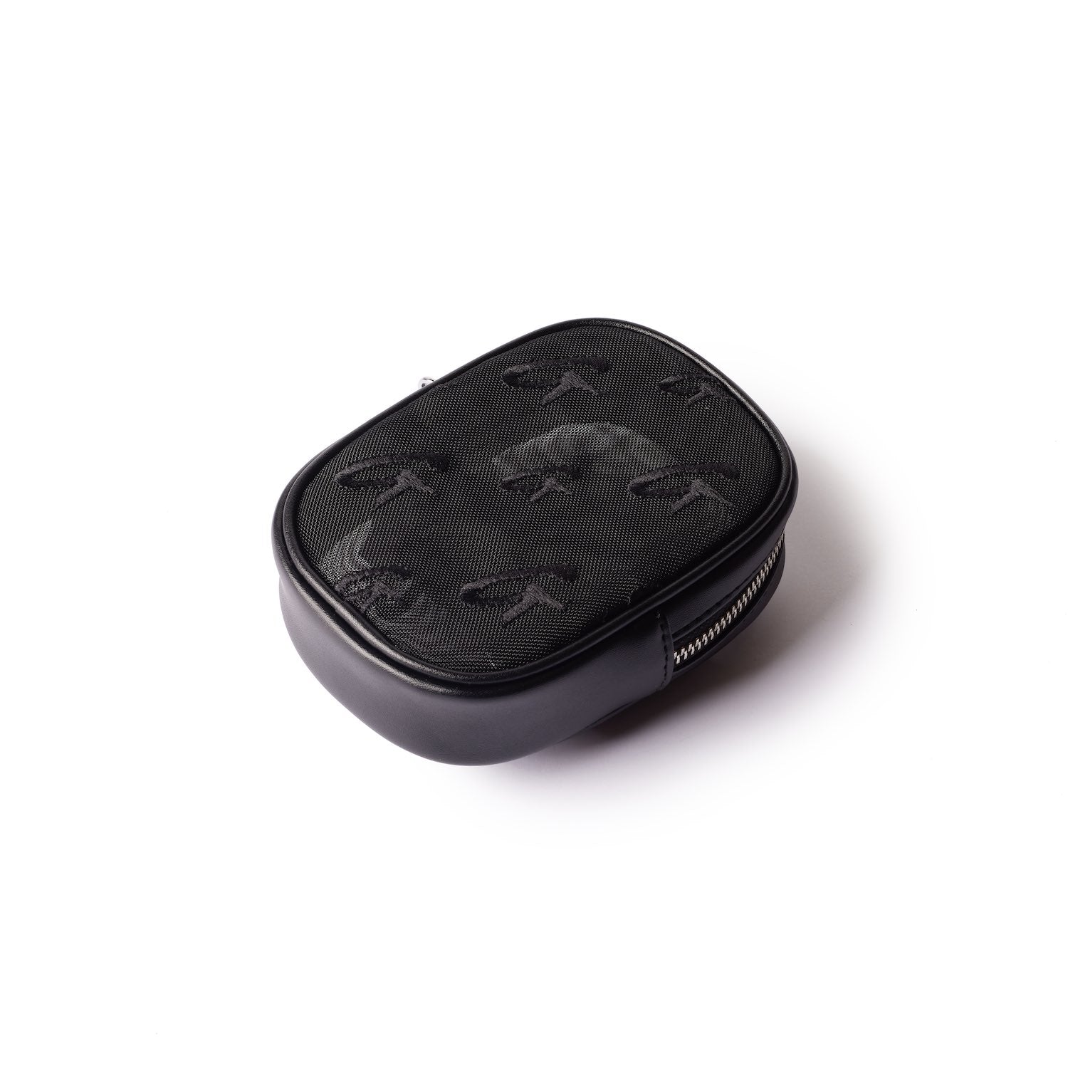 Black mesh monogram wristlet with a zip closure, featuring embossed logo pattern on the surface.